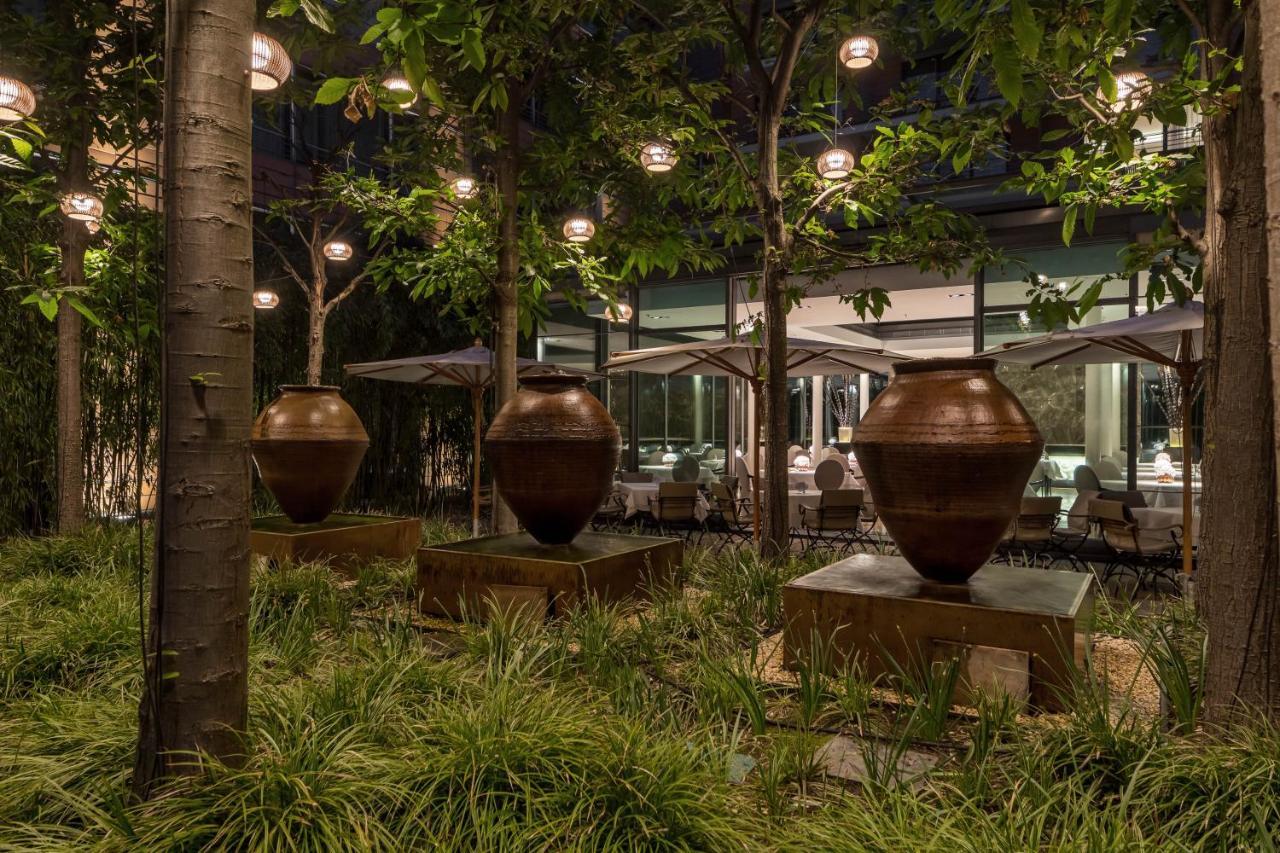 فندق ذا ماندالا برلين المظهر الخارجي الصورة The outdoor dining area at the restaurant